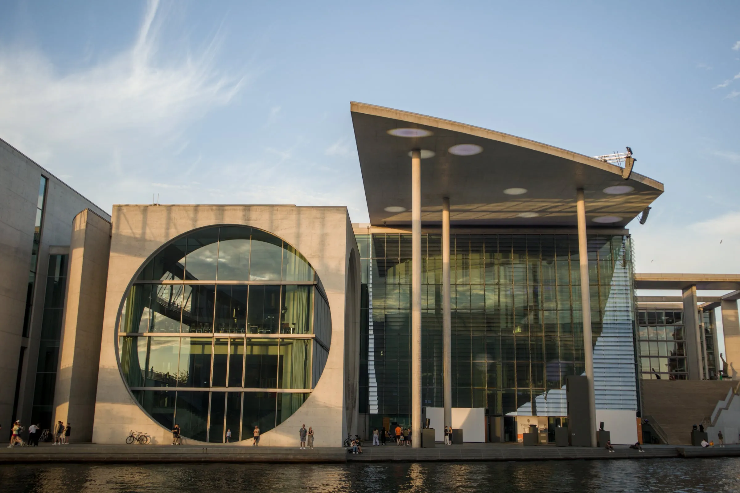 Modern concrete circular window facade on the Spree riverfront